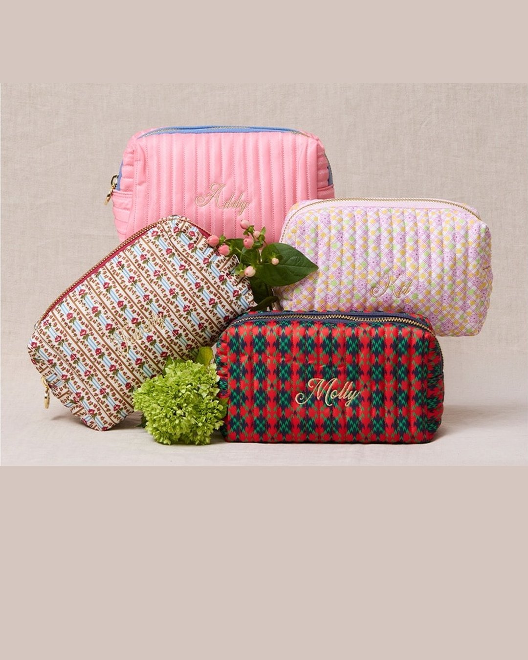 Five quilted Stoney Clover Lane pouches in Addy, Kit, Felicity and Molly prints, each embroidered with the character name.
