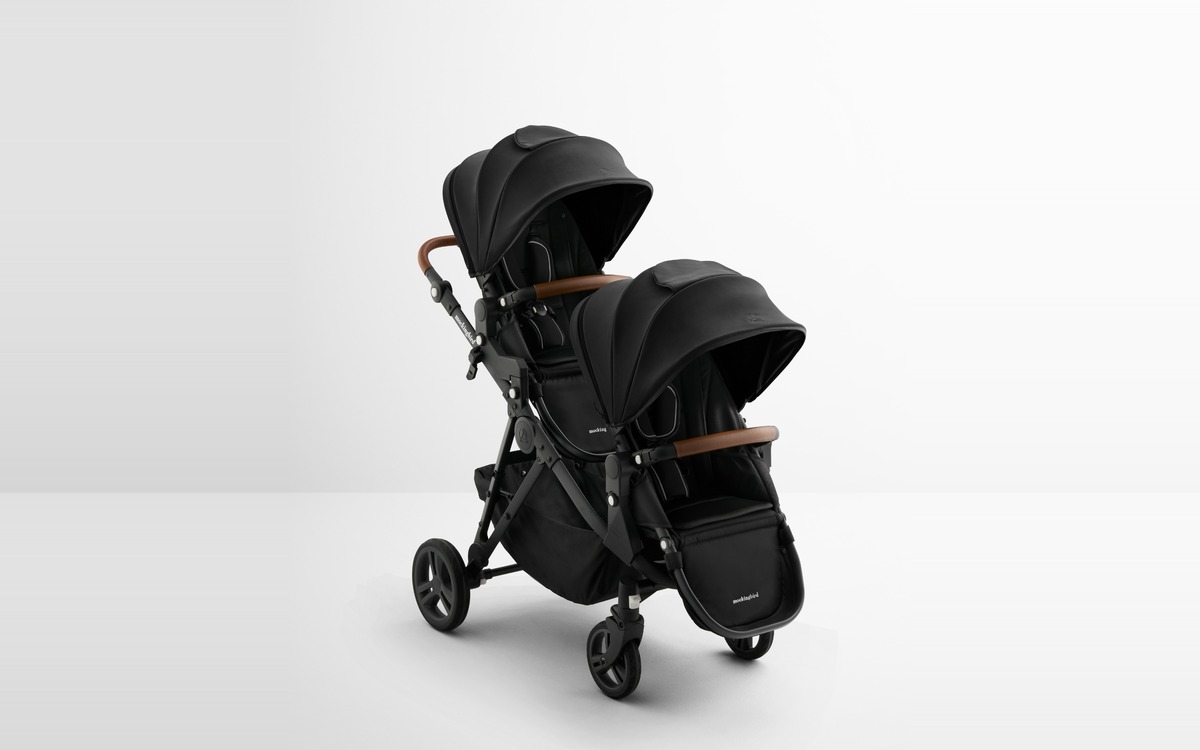 The Mockingbird Single-to-Double Stroller 3.0 in black, photographed in a plain studio.