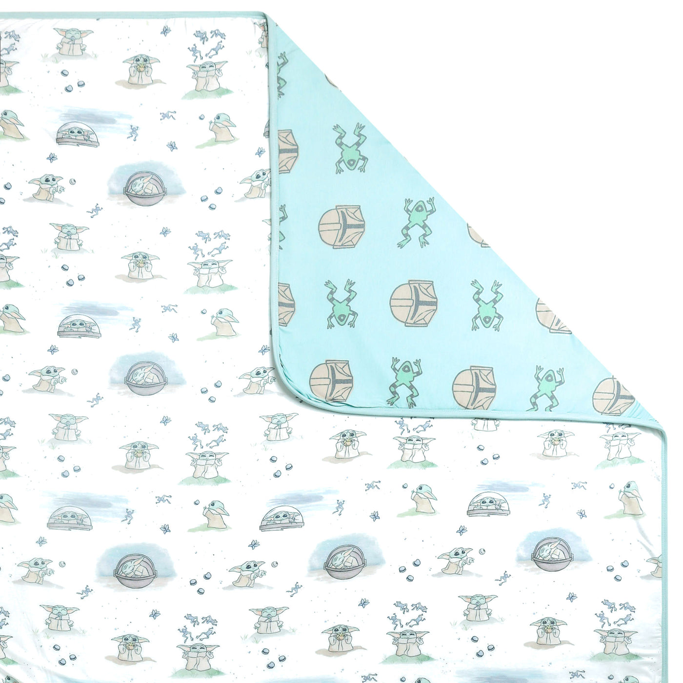 The Star Wars Grogu twin cloud comforter, folded at the corner to show the gray-blue helmet print on the reverse.