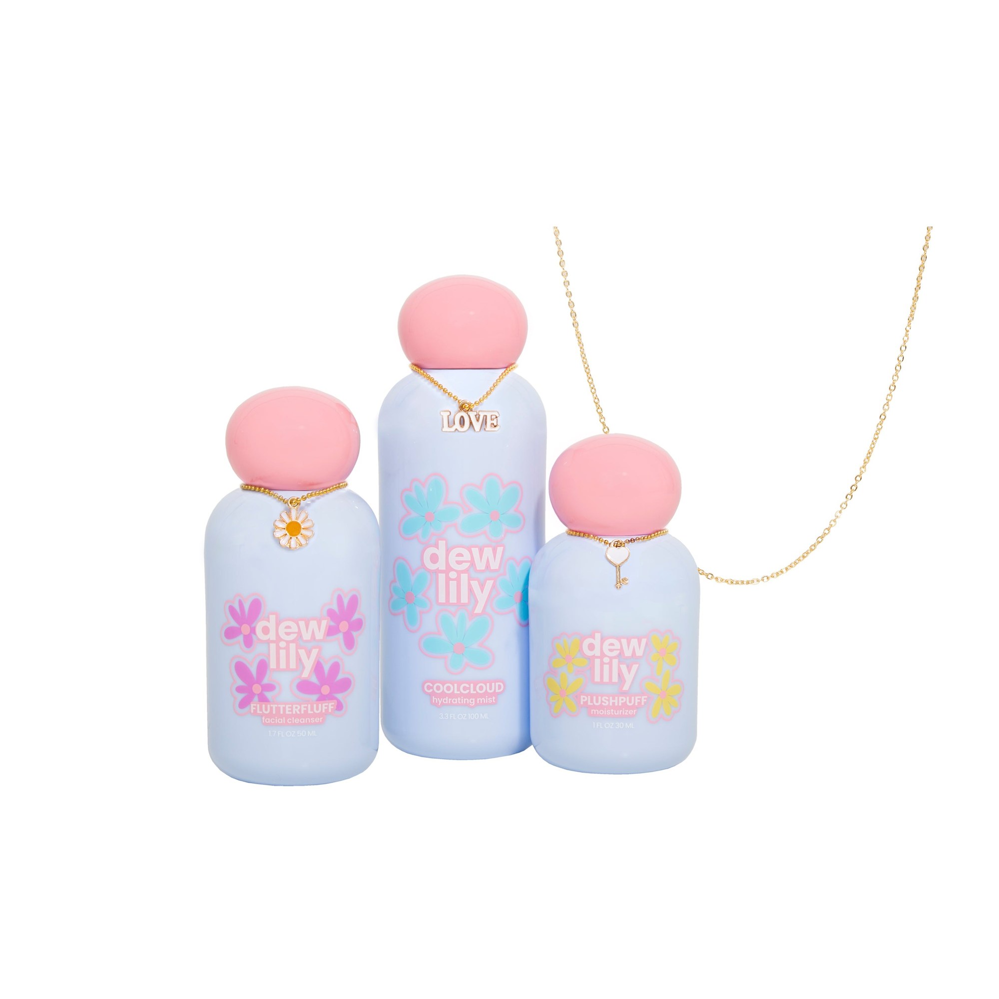 The Dew Lily Dream Collection: three pastel blue bottles with pink caps, Flutterfluff, Coolcloud and Plushpuff, with a gold charm necklace. Photo: Dew Lily.