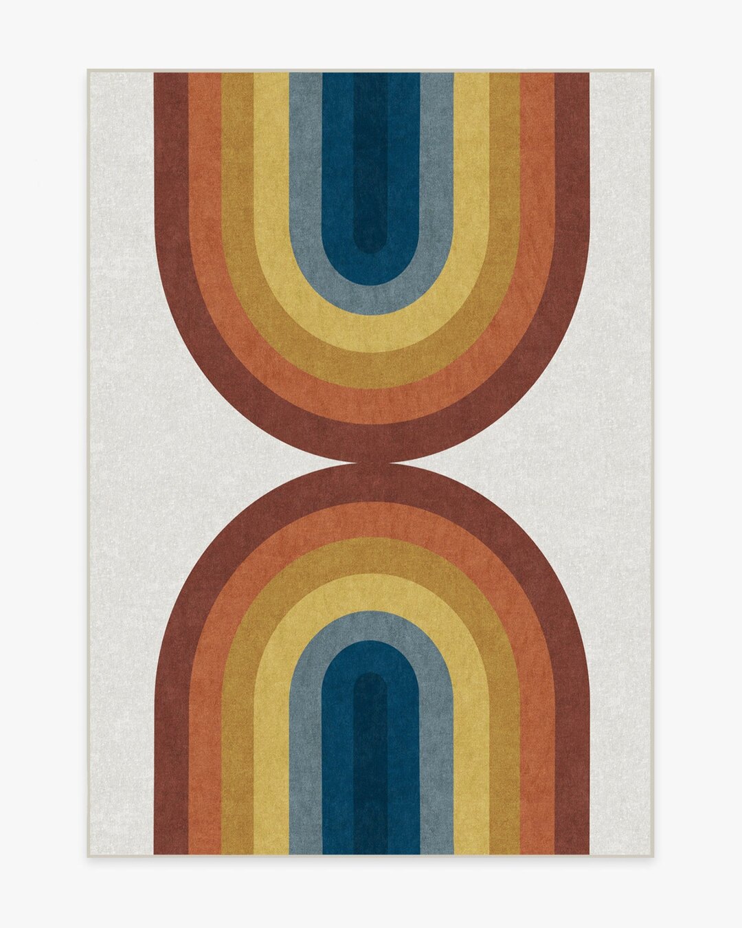 The Ruggable Absida Rainbow washable rug in rust, mustard and navy arches on a cream ground, photographed flat from above.