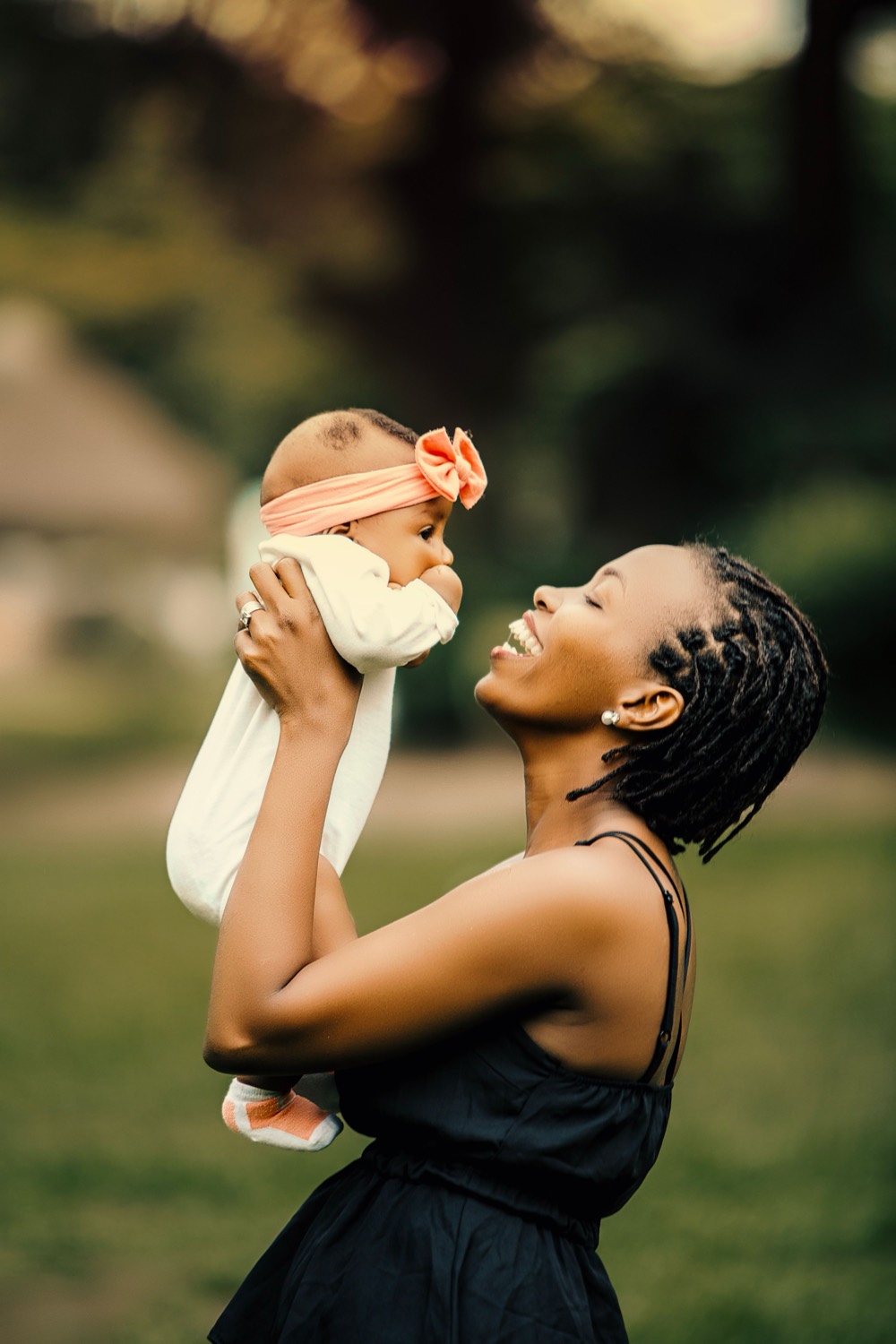 A parent and toddler at home, from the Cubbie Club homepage.